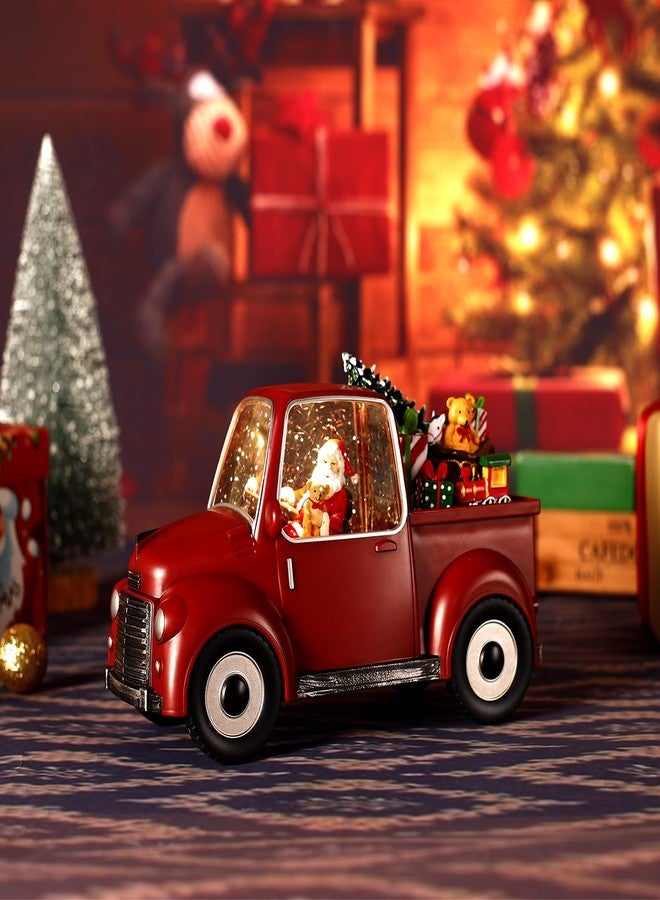 JEDAWN كرة ثلجية موسيقية على شكل شاحنة حمراء مع بريق متلألئ، مزينة بشخصية سانتا، وشجرة عيد الميلاد، وهدايا، ودب، وقطار صغير، وزينة عيد الميلاد. - Image 2